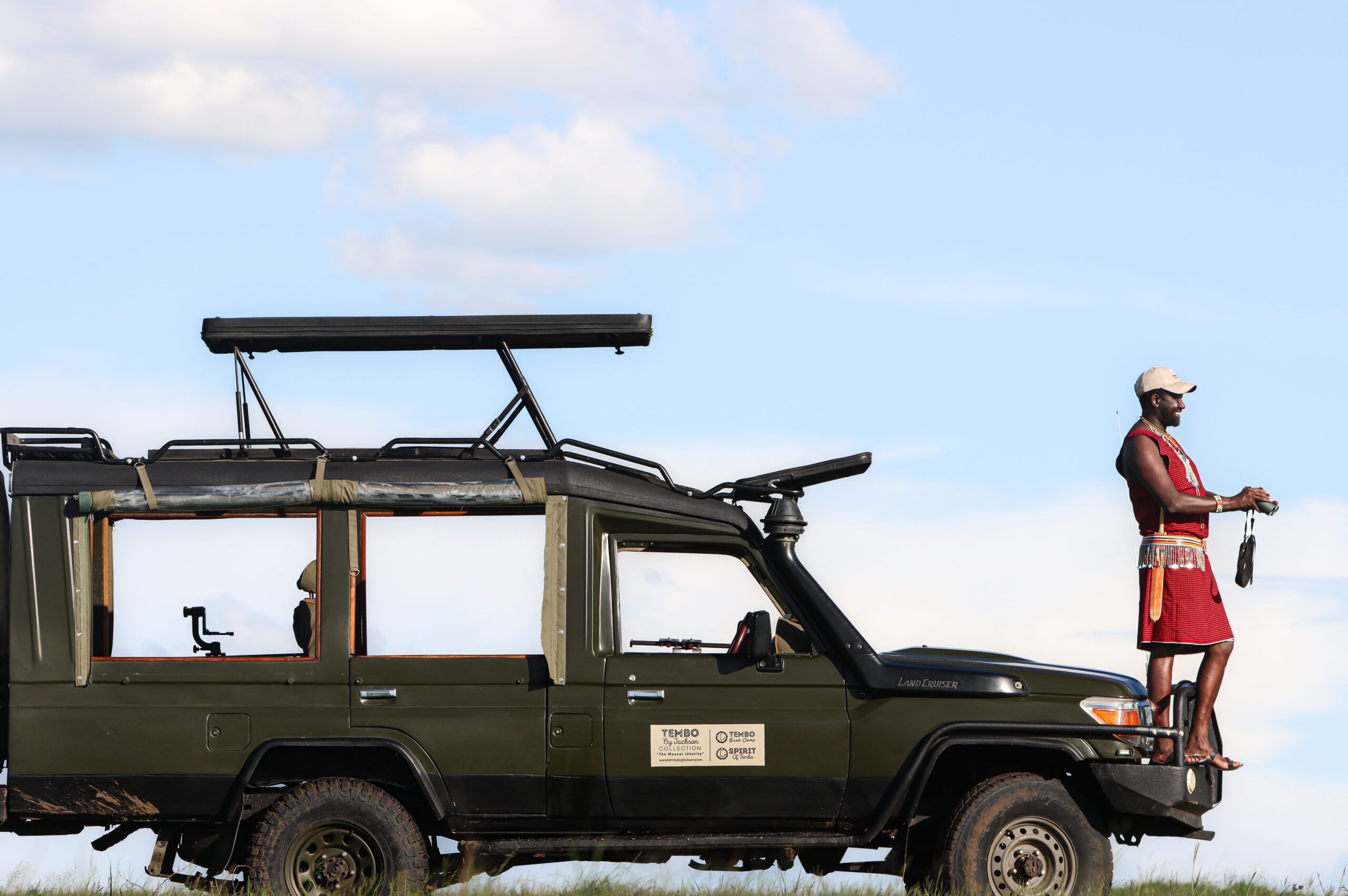 Jackson Naurori - Profile with Vehicle (Angle 3) - Tembo By Jackson Collection